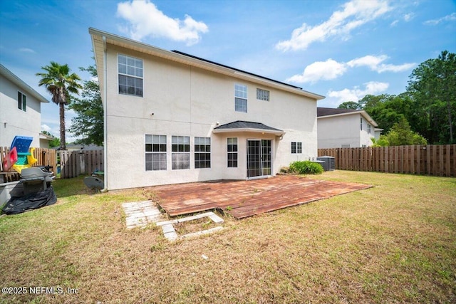12198 Pebble Point Dr S, Jacksonville, FL 32218 - back of property with a deck, stucco siding, and central AC unit