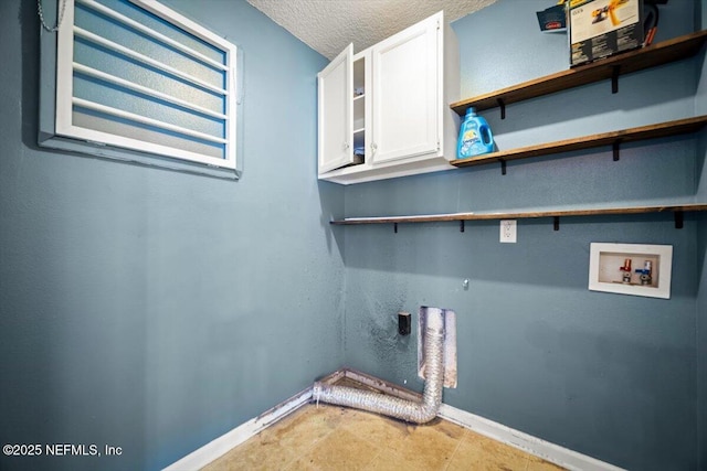 12198 Pebble Point Dr S, Jacksonville, FL 32218 - laundry area with cabinet space, hookup for a washing machine, hookup for an electric dryer, baseboards, and a textured ceiling
