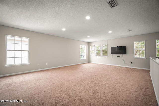 12198 Pebble Point Dr S, Jacksonville, FL 32218 - unfurnished room featuring carpet floors, a textured ceiling, baseboards, and recessed lighting
