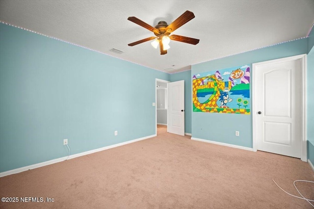 12198 Pebble Point Dr S, Jacksonville, FL 32218 - unfurnished bedroom with baseboards, carpet floors, a ceiling fan, and a textured ceiling