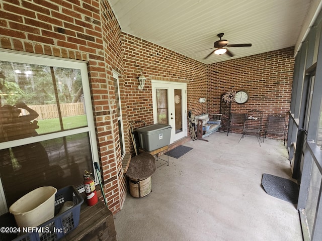 sunroom / solarium with ceiling fan