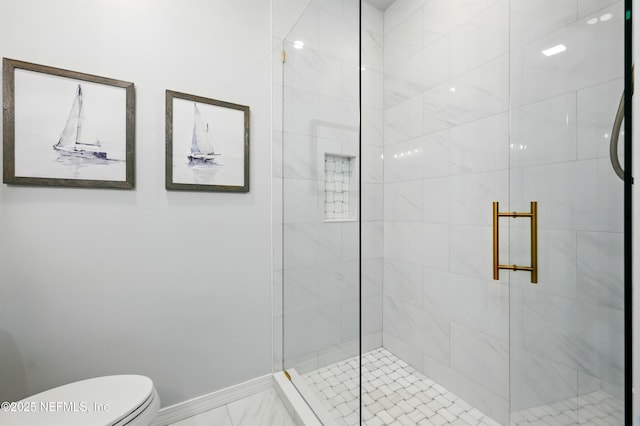 626 Ponte Vedra Blvd Unit B6, Ponte Vedra Beach, FL 32082 - bathroom with a shower stall, toilet, baseboards, and marble finish flooring