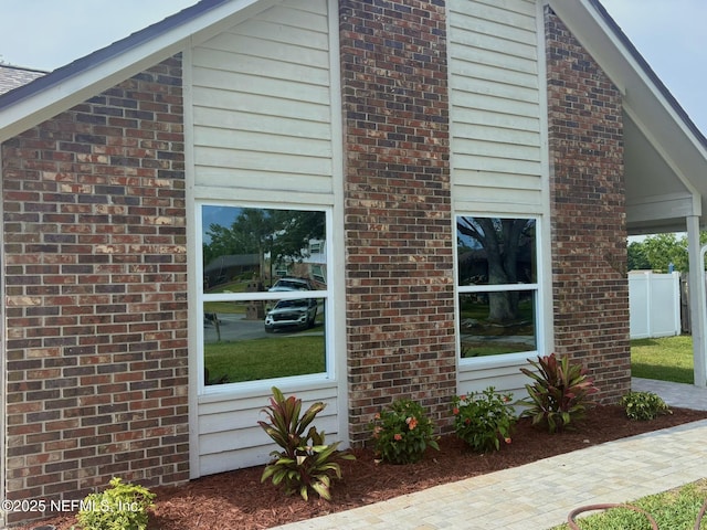946 Cedar Ridge Ct, Orange Park, FL 32065 - view of side of home with brick siding and fence