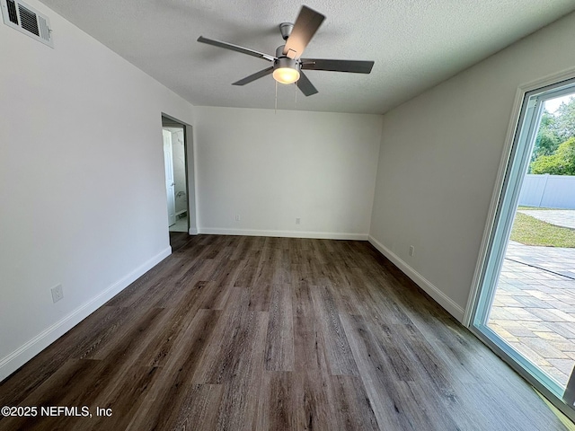 946 Cedar Ridge Ct, Orange Park, FL 32065 - unfurnished room featuring dark wood-type flooring, ceiling fan, and baseboards