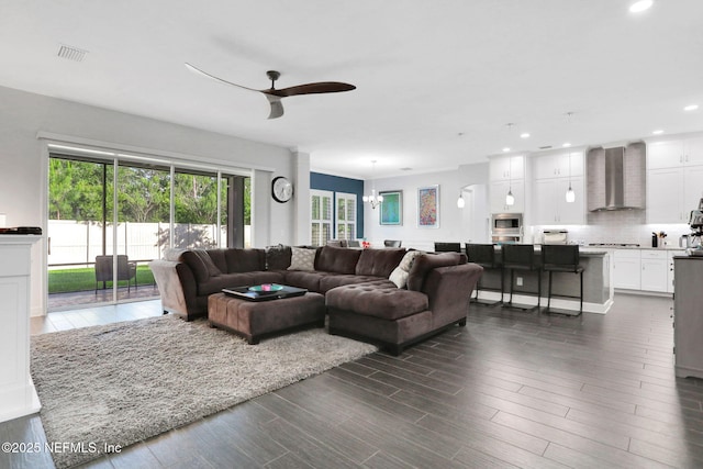 195 Manor Ln, Saint Johns, FL 32259 - living area featuring a ceiling fan, recessed lighting, dark wood-style flooring, and a chandelier