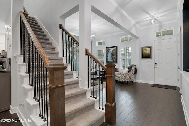 195 Manor Ln, Saint Johns, FL 32259 - foyer with stairway, crown molding, dark wood finished floors, baseboards, and a towering ceiling