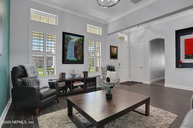 195 Manor Ln, Saint Johns, FL 32259 - living room featuring crown molding, dark wood-type flooring, baseboards, and healthy amount of natural light
