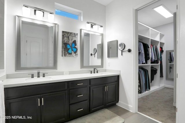 195 Manor Ln, Saint Johns, FL 32259 - full bath featuring double vanity, a spacious closet, and baseboards