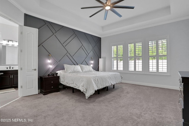 195 Manor Ln, Saint Johns, FL 32259 - bedroom with a raised ceiling, light colored carpet, ornamental molding, baseboards, and connected bathroom