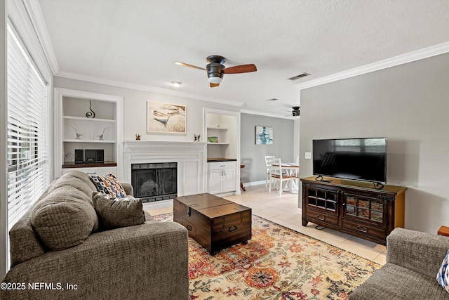 10200 Belle Rive Blvd Unit 136, Jacksonville, FL 32256 - living room with ceiling fan, built in features, crown molding, light tile patterned floors, and a fireplace
