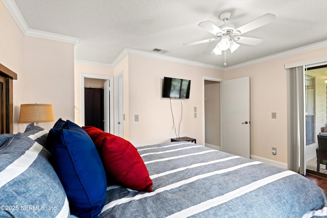 10200 Belle Rive Blvd Unit 136, Jacksonville, FL 32256 - bedroom featuring ornamental molding, a textured ceiling, wood finished floors, a ceiling fan, and baseboards