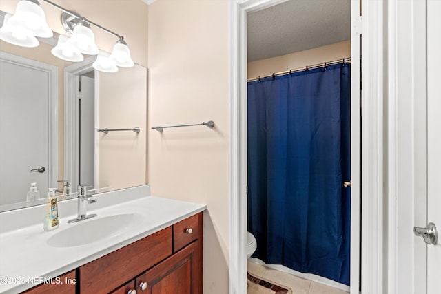 10200 Belle Rive Blvd Unit 136, Jacksonville, FL 32256 - full bath with tile patterned flooring, vanity, toilet, a shower with shower curtain, and a textured ceiling