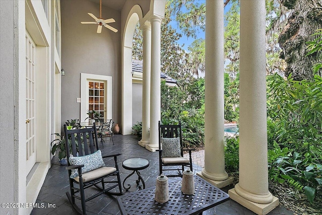 view of patio with ceiling fan