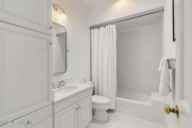 full bath featuring toilet, tile patterned flooring, vanity, and shower / bath combo