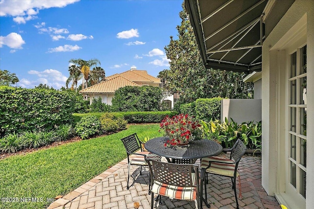 view of patio with outdoor dining space