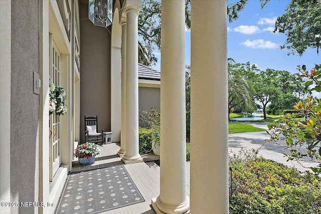 view of patio / terrace with a water view