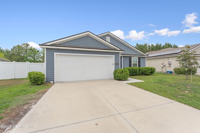 view of front of home featuring a garage and concrete driveway