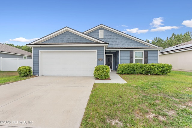 view of front of home featuring an attached garage and concrete driveway