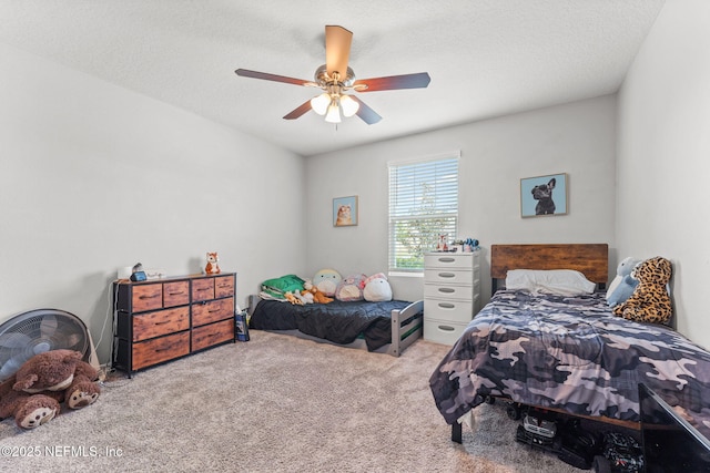 carpeted bedroom featuring a ceiling fan
