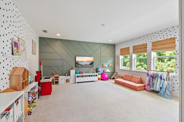 game room featuring wallpapered walls, carpet floors, a textured ceiling, and recessed lighting