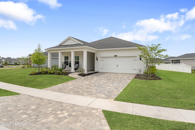 321 Varner Way, Saint Augustine, FL 32092 - view of front of property featuring decorative driveway, a garage, a porch, and a shingled roof