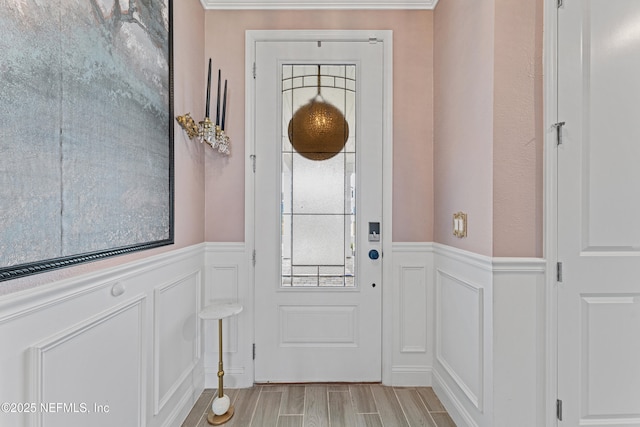 321 Varner Way, Saint Augustine, FL 32092 - foyer with a decorative wall, wainscoting, and light wood-style flooring