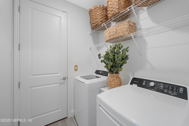 321 Varner Way, Saint Augustine, FL 32092 - clothes washing area with independent washer and dryer and light wood-style floors
