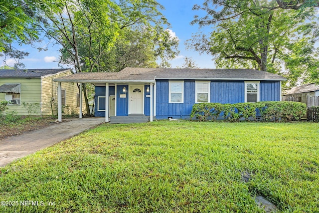 2617 Lake Shore Blvd, Jacksonville, FL 32210 - view of front of property featuring driveway and a front yard