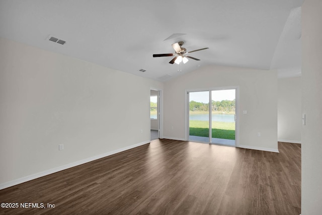 37295 Whisper Way, Hilliard, FL 32046 - spare room featuring ceiling fan, lofted ceiling, dark wood finished floors, and baseboards