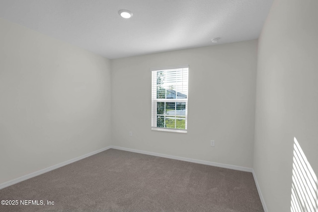 37295 Whisper Way, Hilliard, FL 32046 - carpeted empty room featuring baseboards