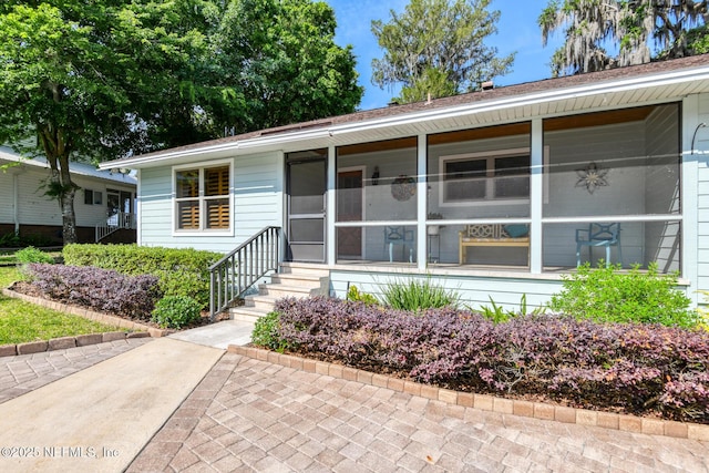 130 Woodbury Trl, Satsuma, FL 32189 - view of front of property featuring a sunroom