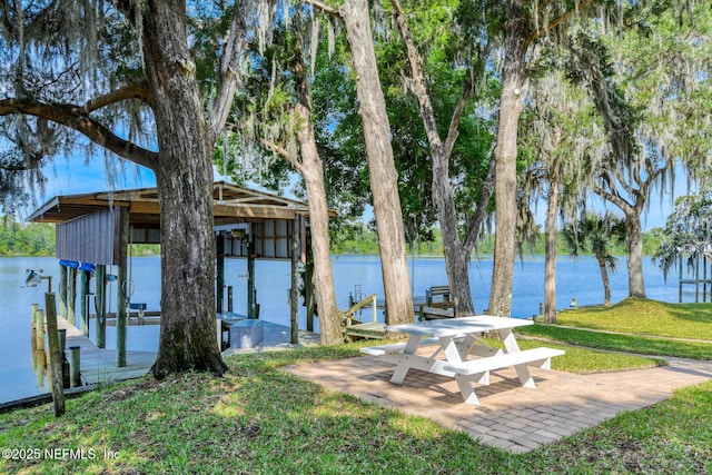 130 Woodbury Trl, Satsuma, FL 32189 - dock area featuring boat lift, a water view, and a lawn