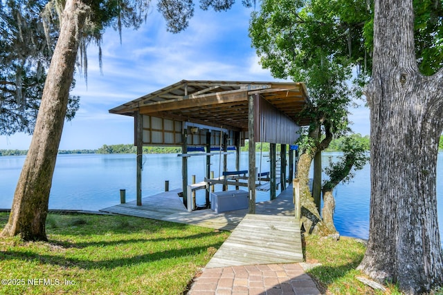 130 Woodbury Trl, Satsuma, FL 32189 - dock area with boat lift and a water view