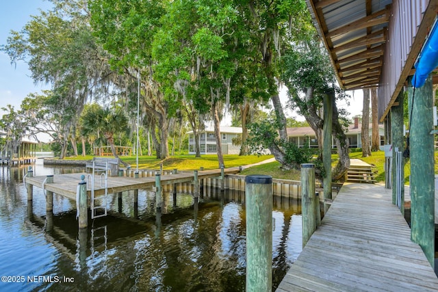 130 Woodbury Trl, Satsuma, FL 32189 - dock area with a water view and a lawn