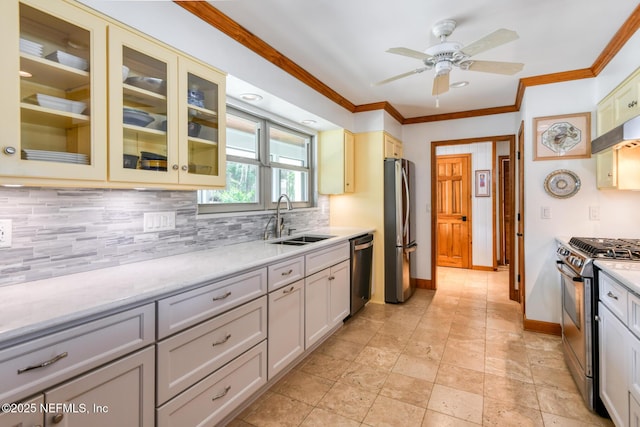 130 Woodbury Trl, Satsuma, FL 32189 - kitchen featuring appliances with stainless steel finishes, a sink, tasteful backsplash, crown molding, and under cabinet range hood