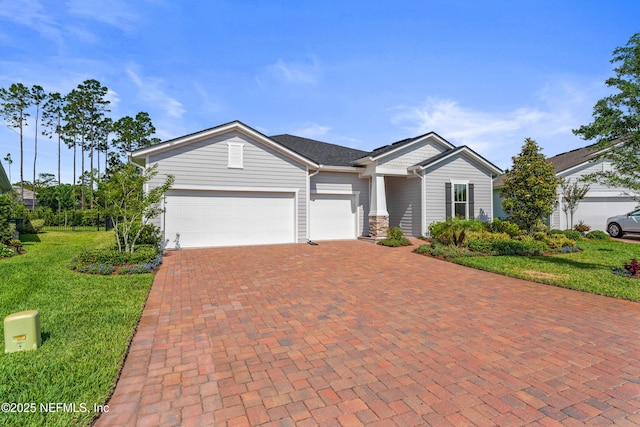 360 Rustic Mill Dr, Saint Augustine, FL 32092 - view of front of property featuring decorative driveway, a garage, and a front yard