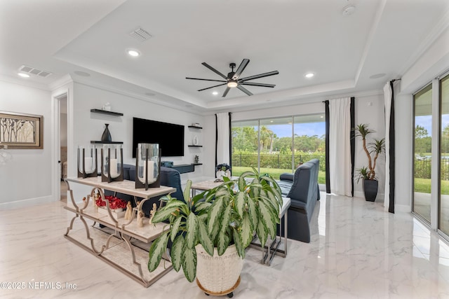 360 Rustic Mill Dr, Saint Augustine, FL 32092 - living area featuring a raised ceiling, plenty of natural light, light marble finish floors, ceiling fan, and recessed lighting