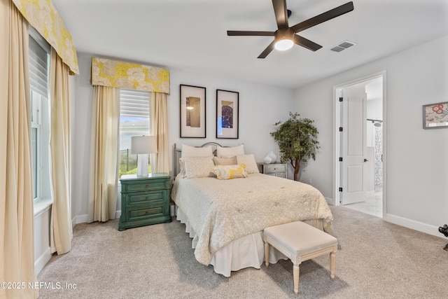 360 Rustic Mill Dr, Saint Augustine, FL 32092 - bedroom with light carpet, baseboards, ensuite bath, and a ceiling fan