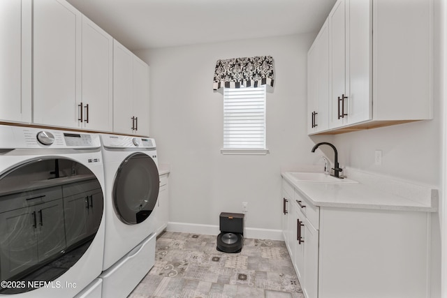 360 Rustic Mill Dr, Saint Augustine, FL 32092 - laundry area with washer and clothes dryer, cabinet space, and baseboards