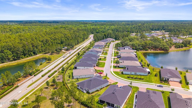360 Rustic Mill Dr, Saint Augustine, FL 32092 - aerial view of residential area featuring a heavily wooded area and a nearby body of water
