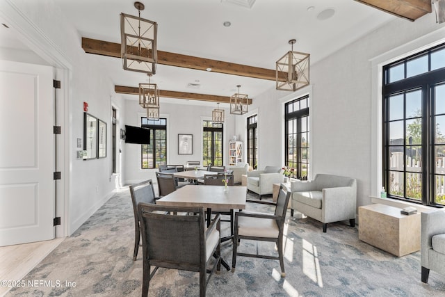 360 Rustic Mill Dr, Saint Augustine, FL 32092 - dining space featuring healthy amount of natural light, beam ceiling, and baseboards