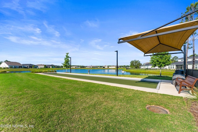 360 Rustic Mill Dr, Saint Augustine, FL 32092 - view of grassy yard featuring a bocce ball area, a water view, and a residential view