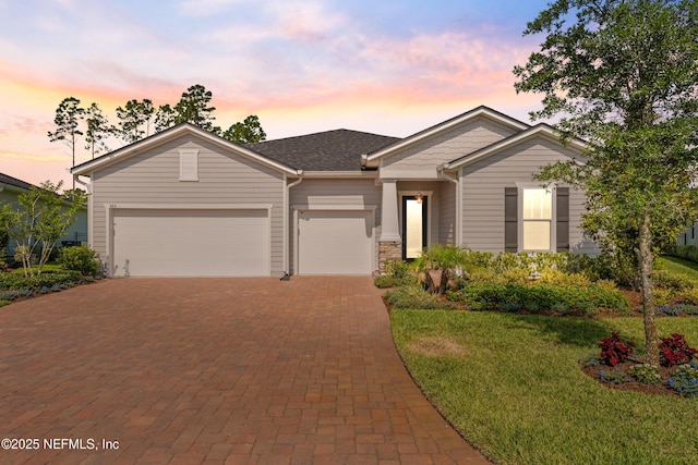 360 Rustic Mill Dr, Saint Augustine, FL 32092 - view of front facade featuring decorative driveway, a garage, and a front yard