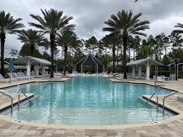 223 Creek Pebble Dr, Ponte Vedra, FL 32081 - community pool featuring a gazebo, a patio, and a pergola