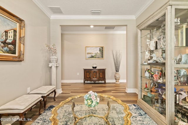 223 Creek Pebble Dr, Ponte Vedra, FL 32081 - living area featuring wood finished floors, crown molding, and baseboards