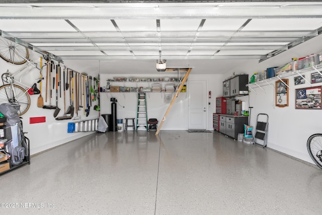 223 Creek Pebble Dr, Ponte Vedra, FL 32081 - garage with baseboards and a garage door opener