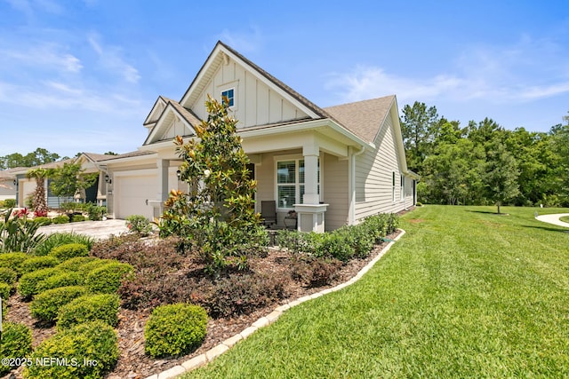 223 Creek Pebble Dr, Ponte Vedra, FL 32081 - view of side of property featuring board and batten siding, an attached garage, a yard, a porch, and driveway