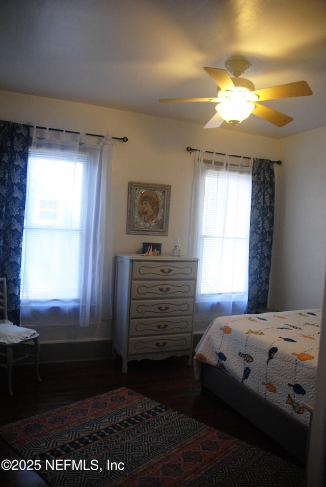 123 Arlington Way, Ormond Beach, FL 32176 - bedroom featuring dark wood-style flooring and a ceiling fan