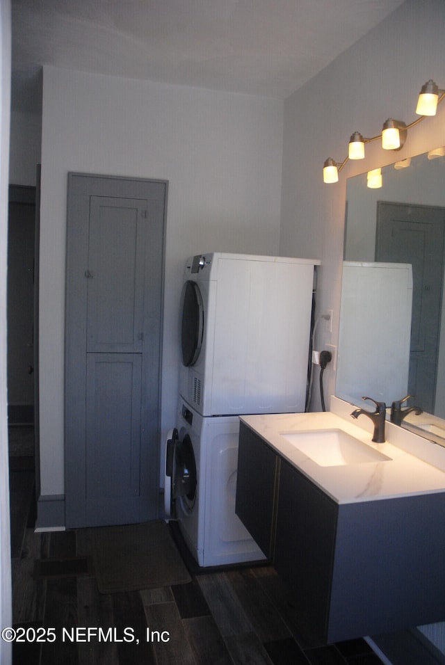 123 Arlington Way, Ormond Beach, FL 32176 - clothes washing area with stacked washing machine and dryer
