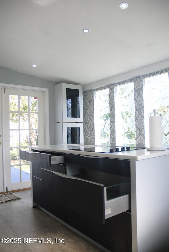 123 Arlington Way, Ormond Beach, FL 32176 - kitchen with recessed lighting and light countertops